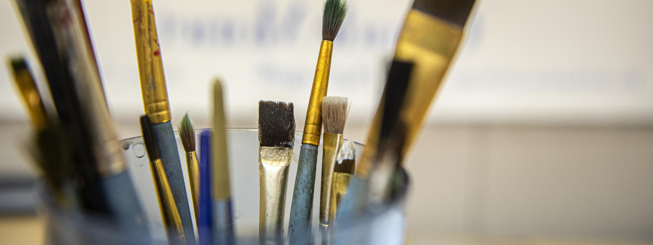 A close up of paint brushes.